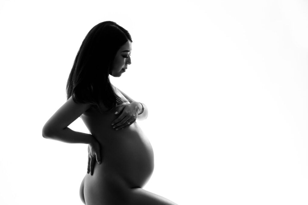 Black and white maternity portrait during a studio pregnancy session