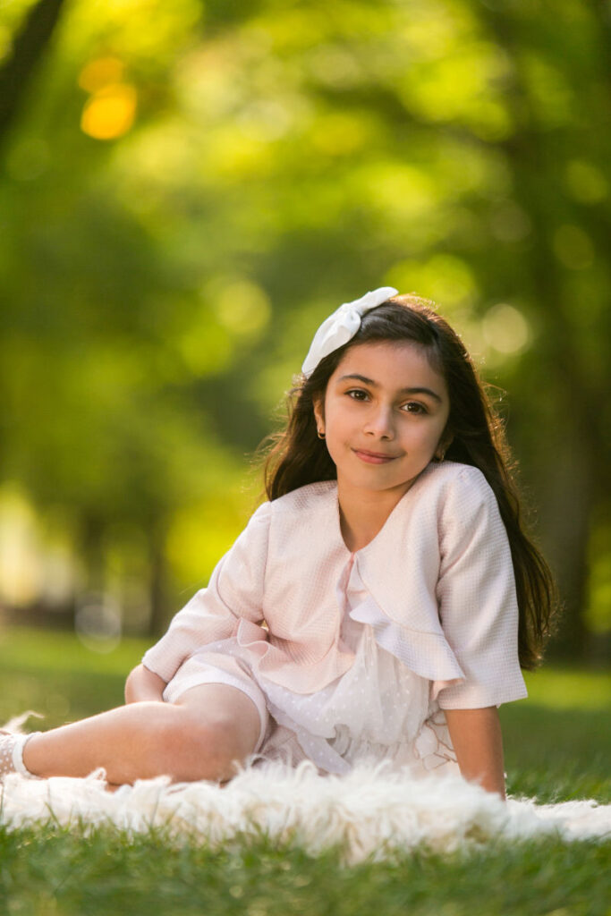 Young girl portrait photographed on location at Boston Public Garden.